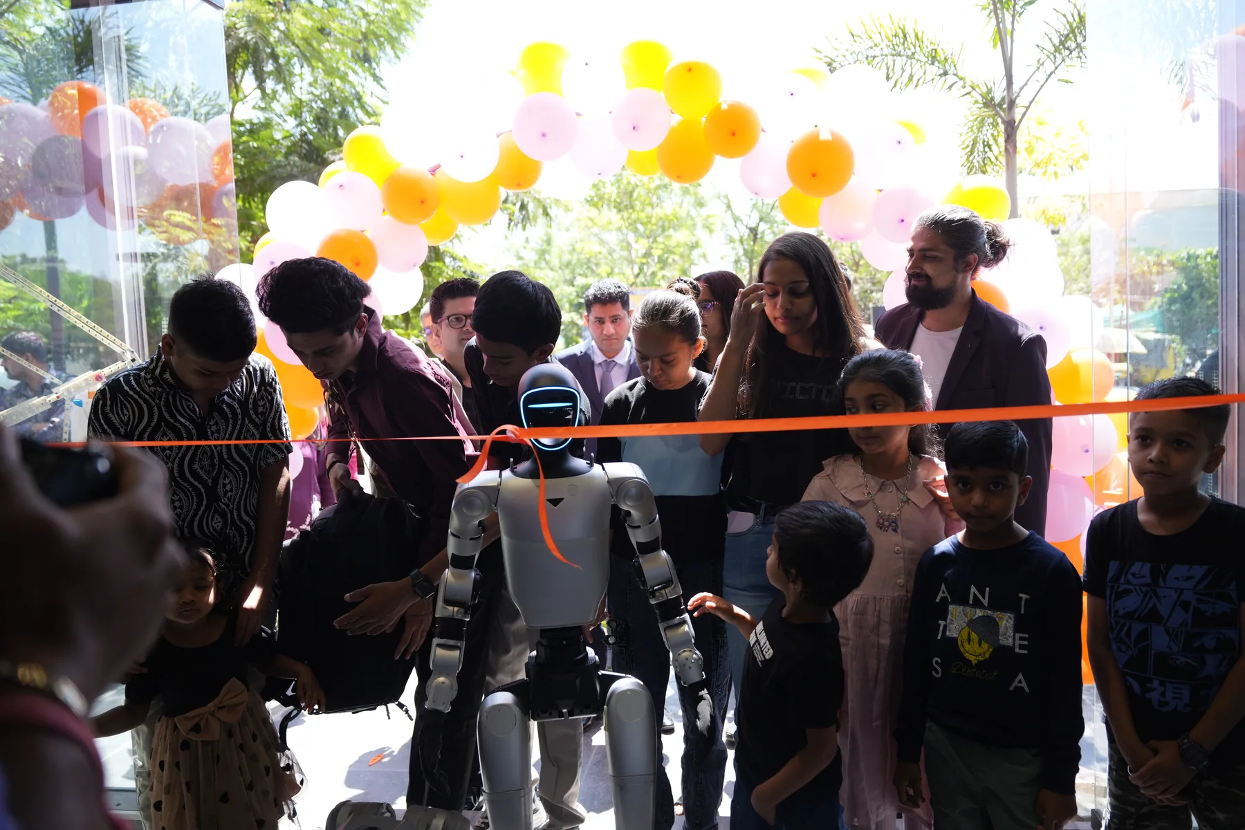 Prizor Robotics Arena ribbon cutting with humanoid